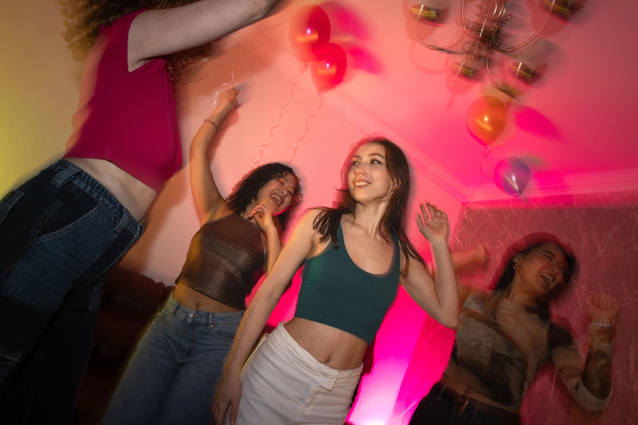 Friends dancing at a weekly social event