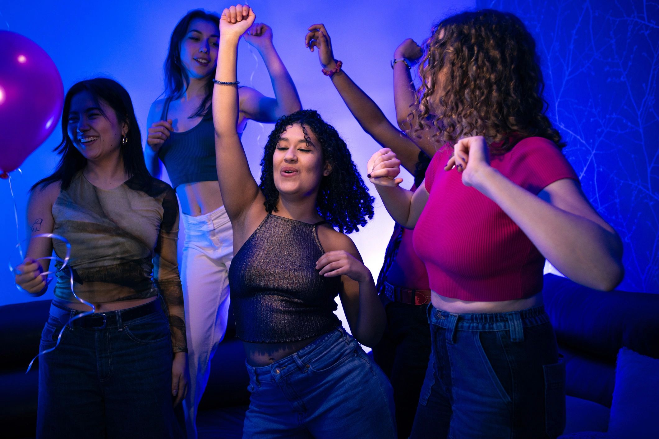 Group enjoying a lively Latin dance club atmosphere