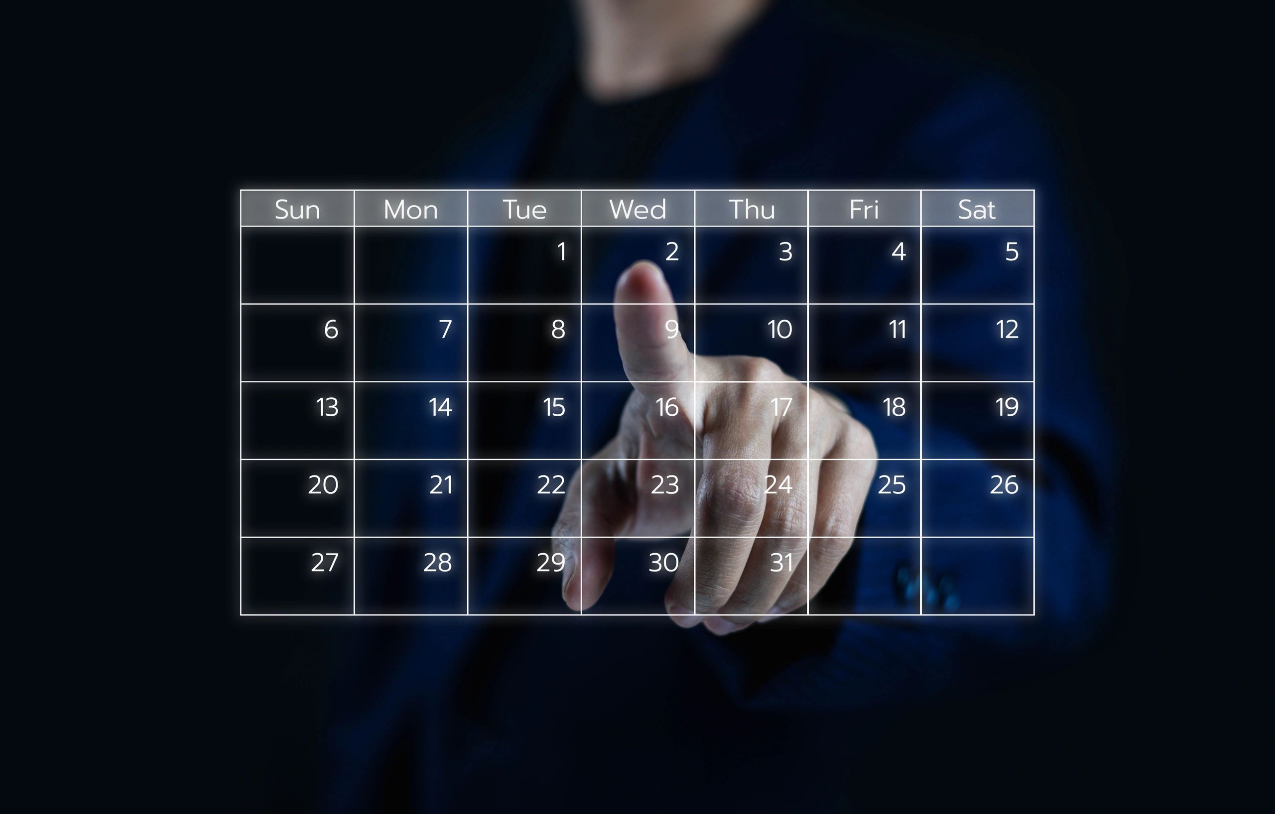 Person using a digital calendar interface