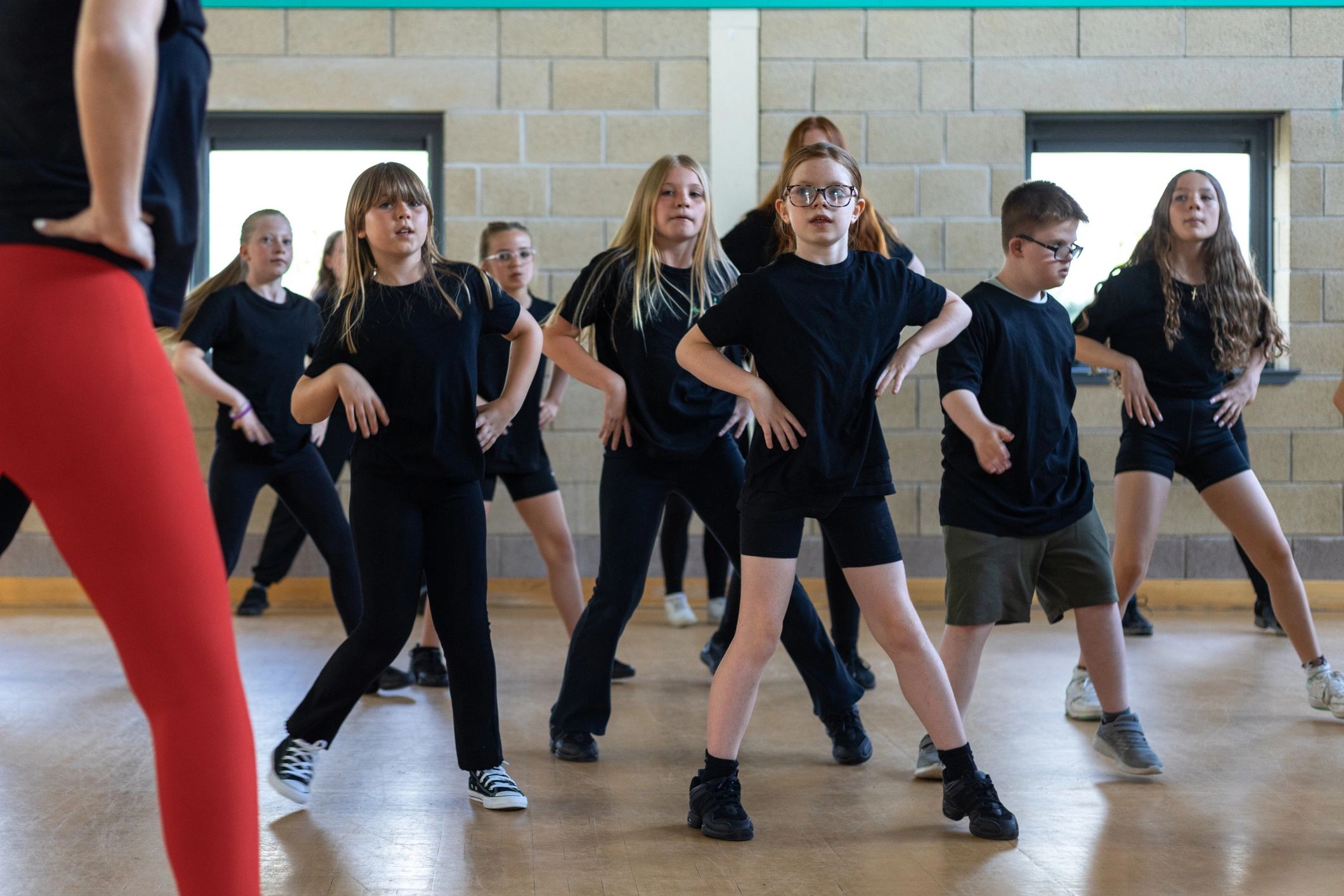 Dance class rehearsal in a community hall